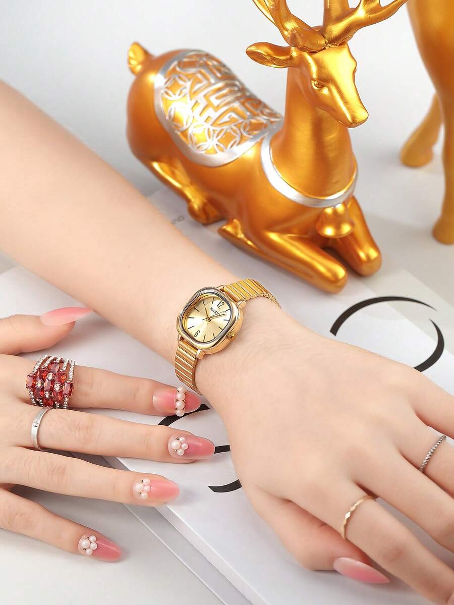 SHEIN ساعة نسائية عصرية كاجوال باللون الذهبي