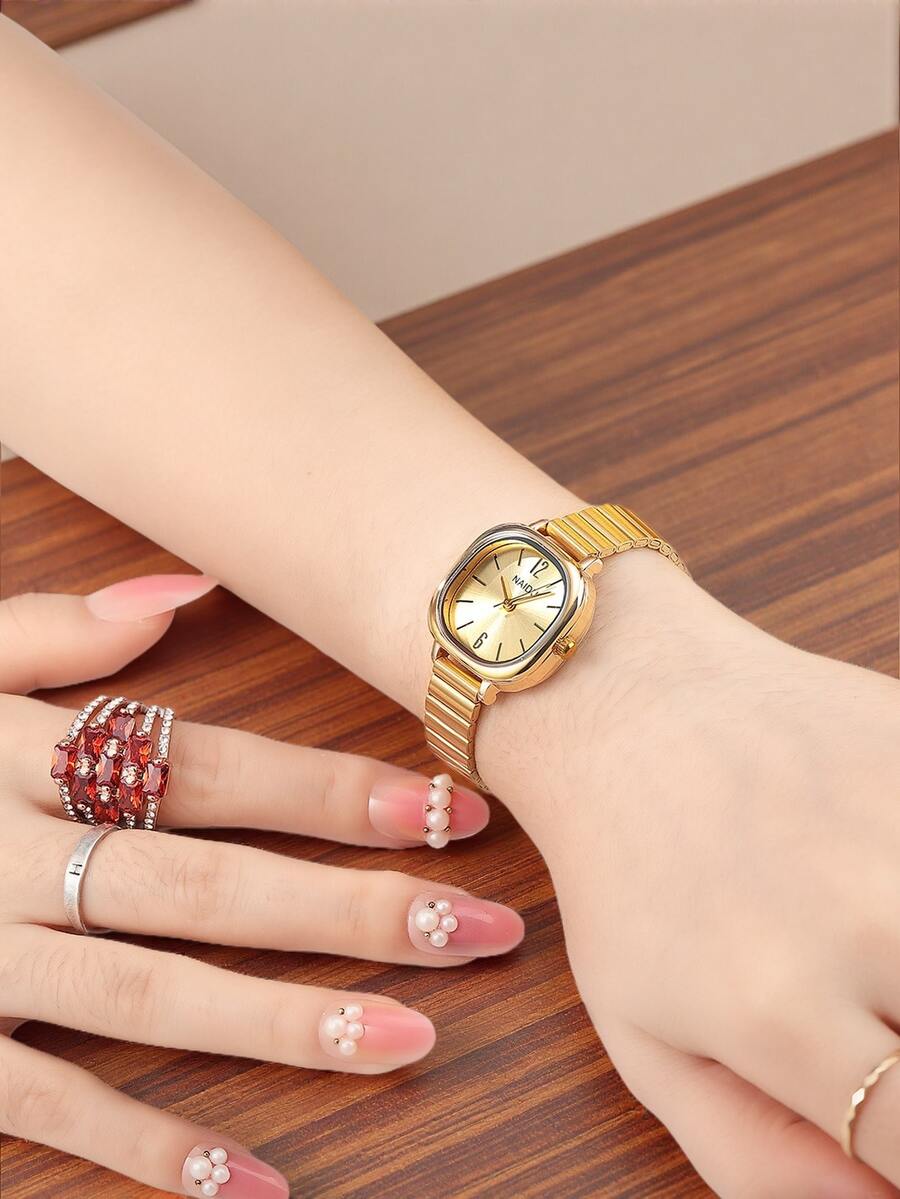 SHEIN ساعة نسائية عصرية كاجوال باللون الذهبي