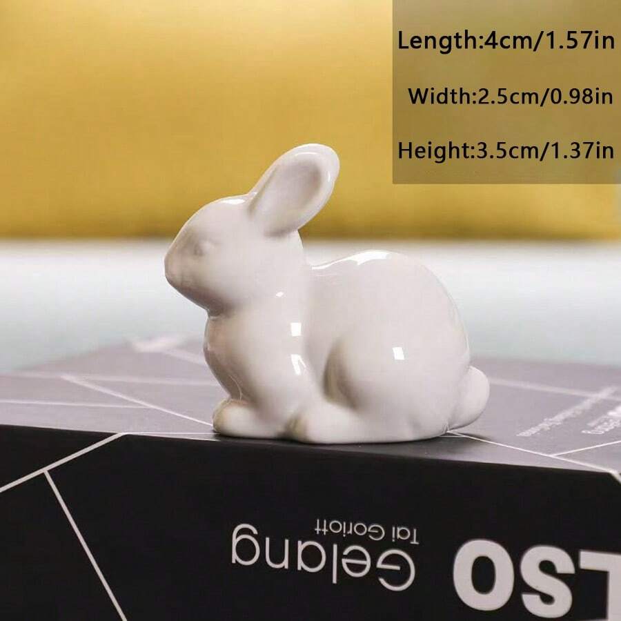 SHEIN تمثال أرنب خزفي أبيض يدوي الصنع للديكور