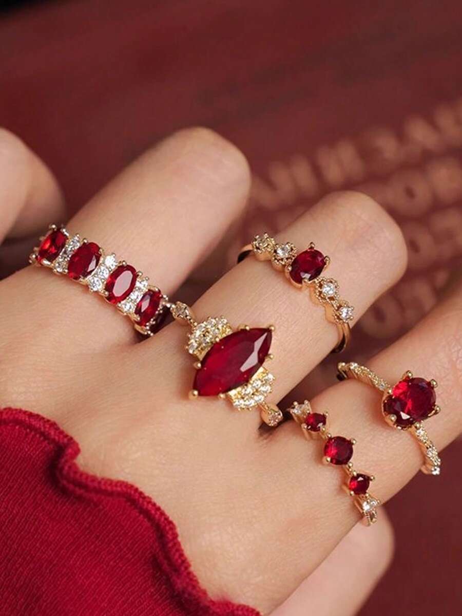 SHEIN مجموعة 5 خواتم ذهبية مرصعة بالراين والأحجار الحمراء