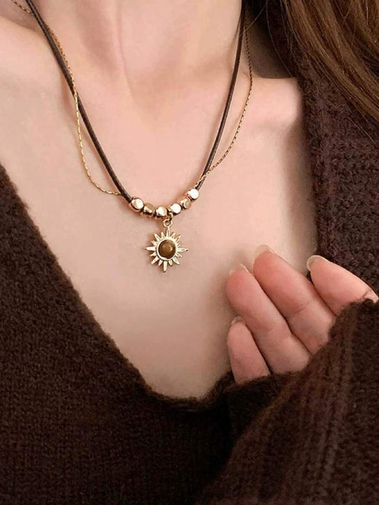 SHEIN قلادة متعددة الطبقات بعقدة عباد الشمس وحجر العين النمري