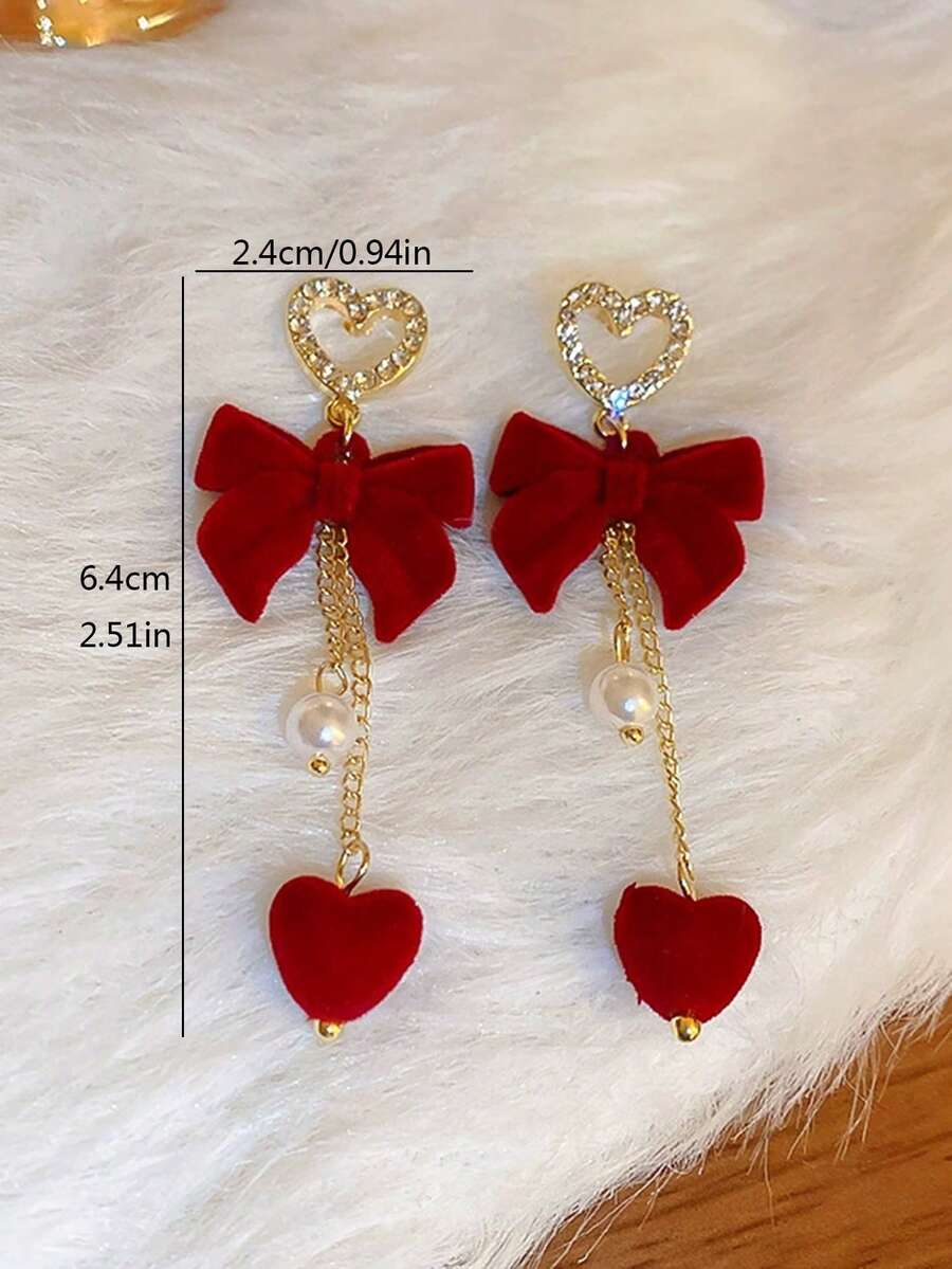 SHEIN زوج أقراط قلبية حمراء مرصعة راين مع شرابة
