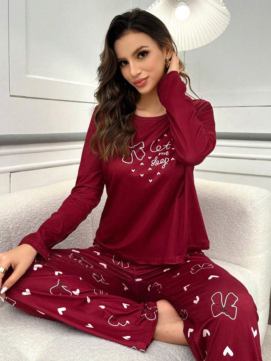 SHEIN طقم بيجامة قطعتين كم طويل بطباعة فيونكة وقلب