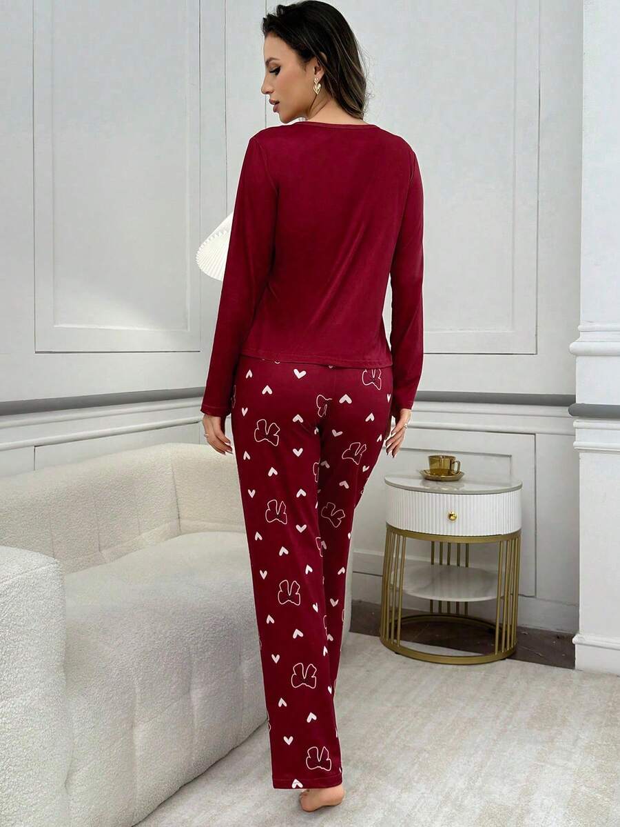 SHEIN طقم بيجامة قطعتين كم طويل بطباعة فيونكة وقلب