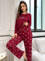 SHEIN طقم بيجامة قطعتين كم طويل بطباعة فيونكة وقلب