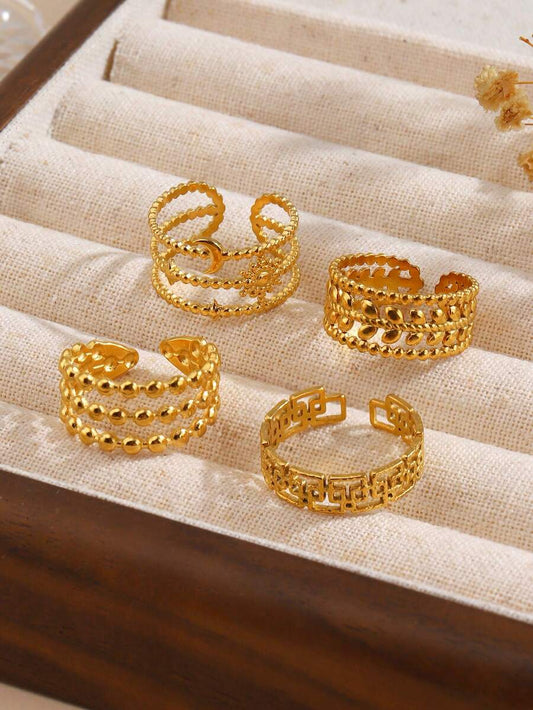 SHEIN طقم 4 خواتم ستانلس ستيل أوراق ونجوم وأقمار