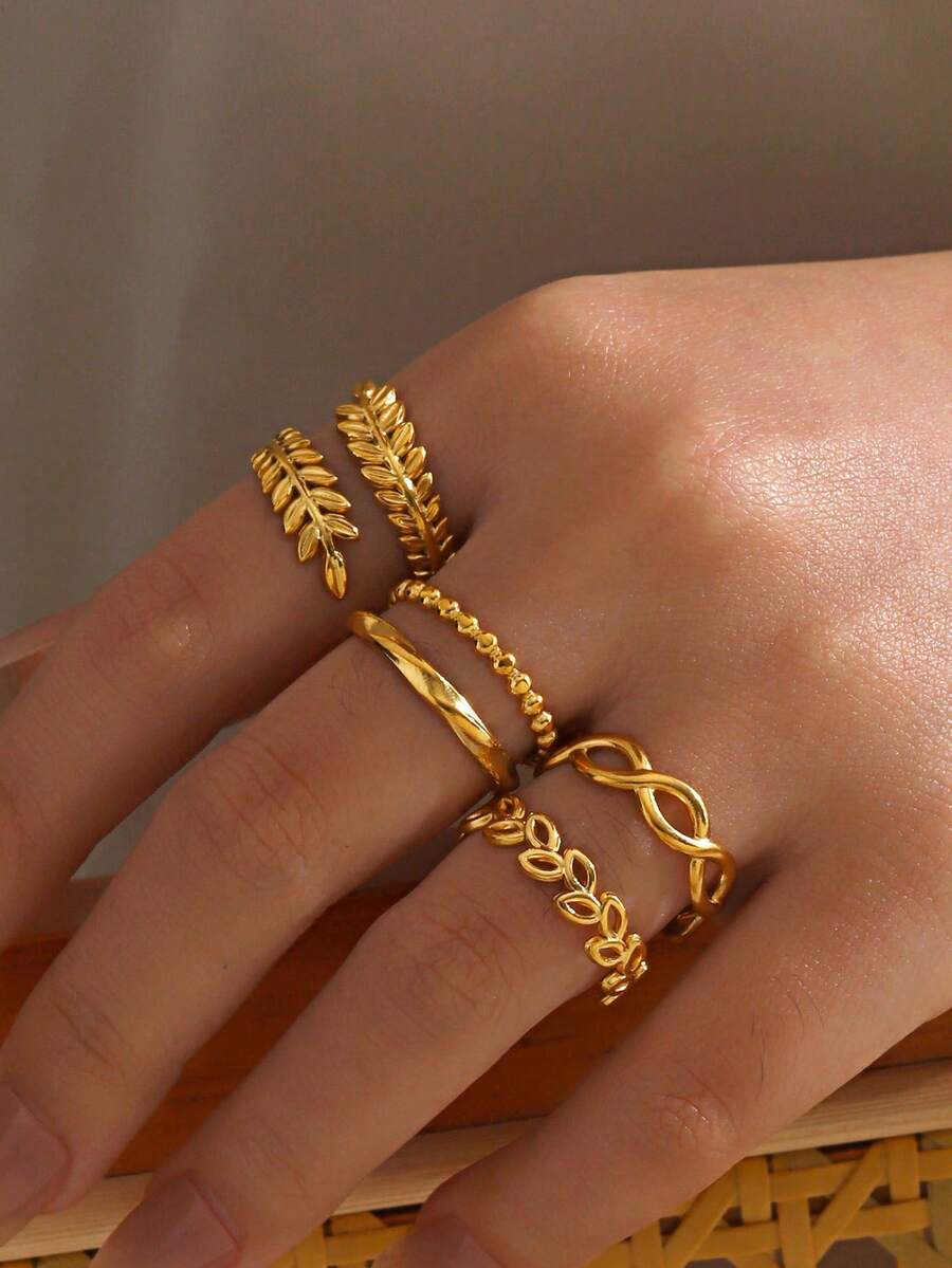 SHEIN طقم 4 خواتم ستانلس ستيل بتصميم أوراق بسيطة