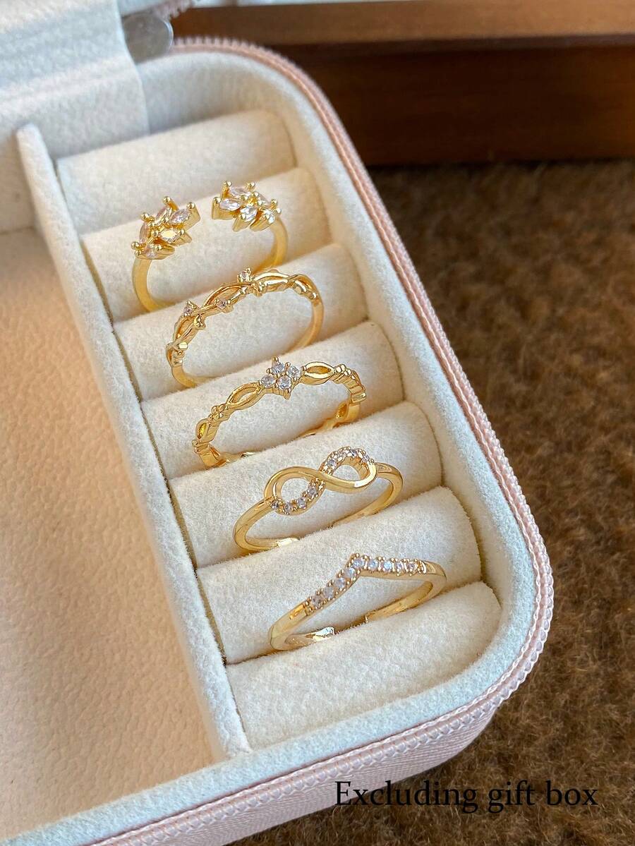 SHEIN طقم 5 خواتم نحاسية بتصميم ورقي رقيق مزينة زركونيا