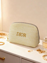 Dior حقيبة مكياج ذهبية من قماش فاخر