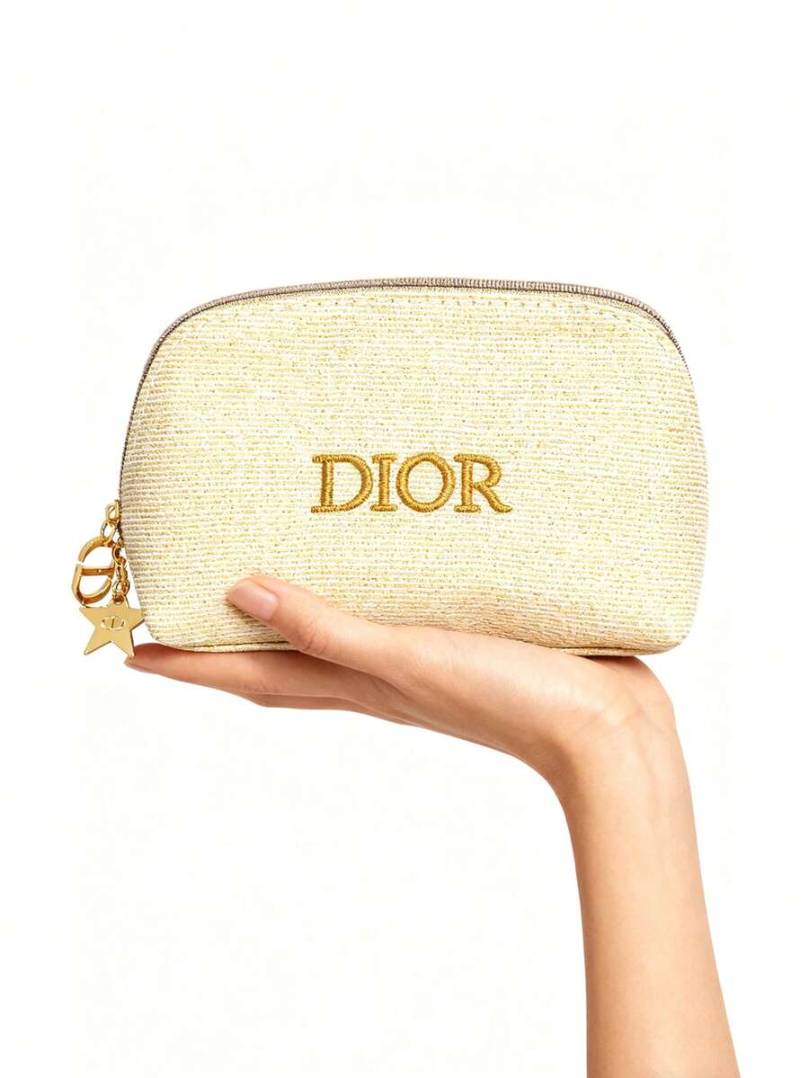 Dior حقيبة مكياج ذهبية بقماش فاخر وشعار ذهبي
