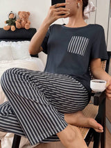 SHEIN طقم بيجامة مخططة أسود وأبيض بأكمام قصيرة وجيوب