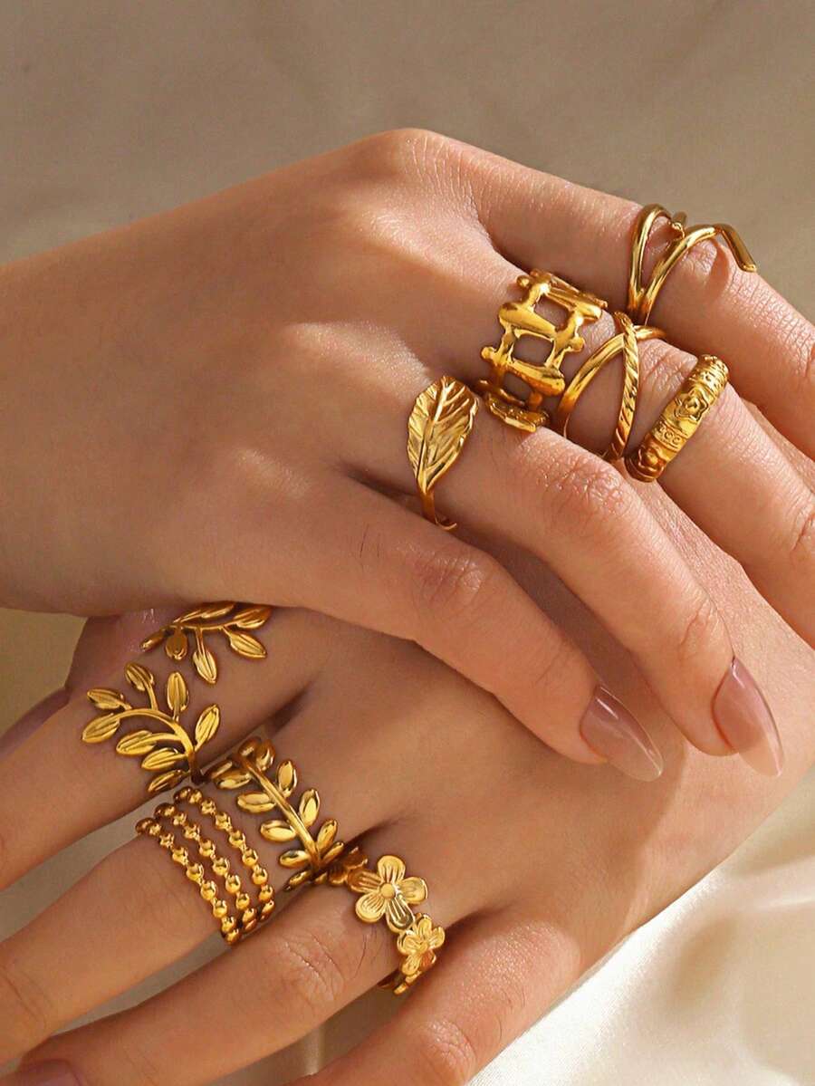 SHEIN طقم خواتم فولاذية مطلية بالذهب بتصميم أوراق وزهور