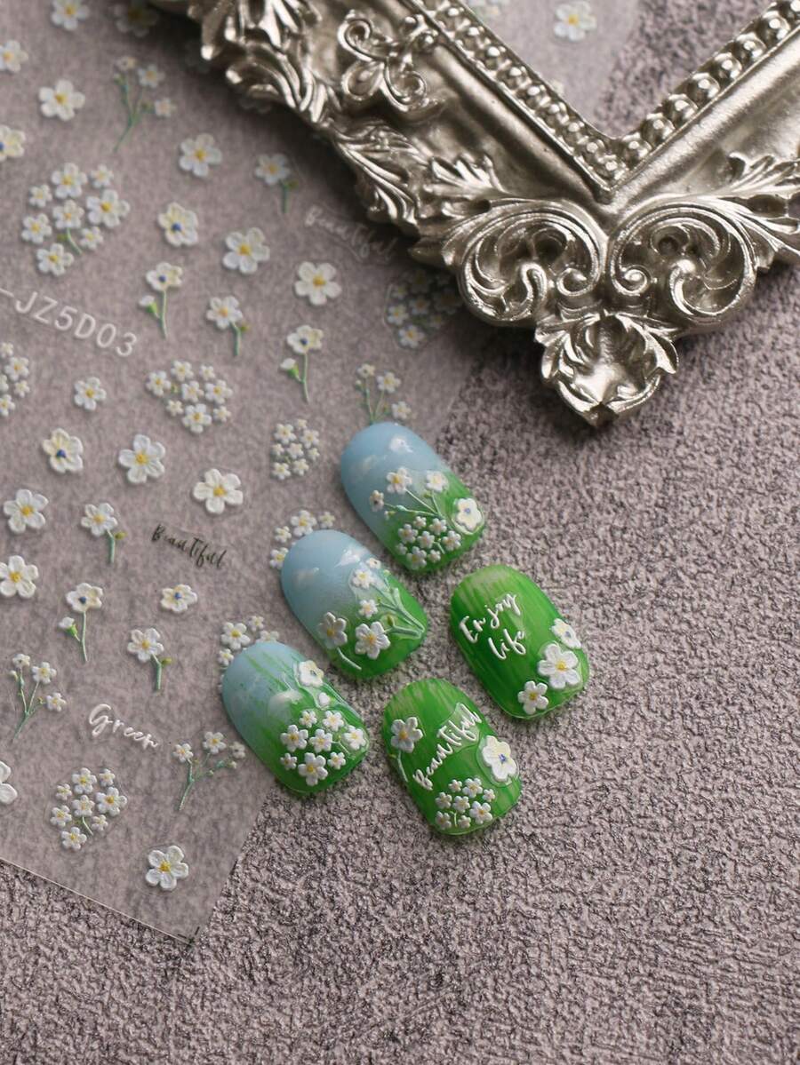 SHEIN ورقتان من ملصقات فن الأظافر مزخرفة بزهور صغيرة