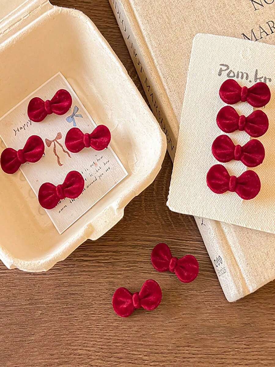 SHEIN مشابك شعر صغيرة مخملية حمراء بشكل فيونكة