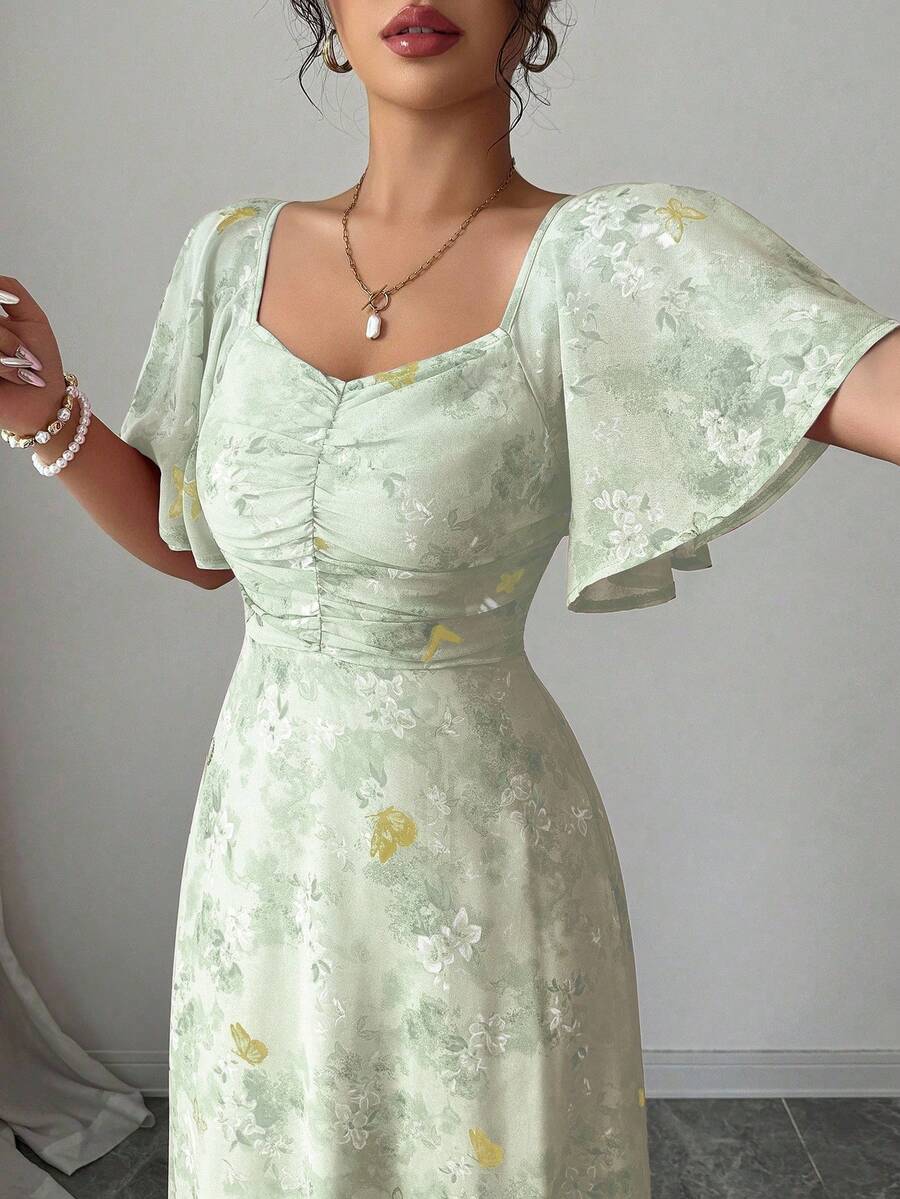 SHEIN Modelyn فستان شيفون بنقشة منقطة وأكمام واسعة وحاشية مطوية