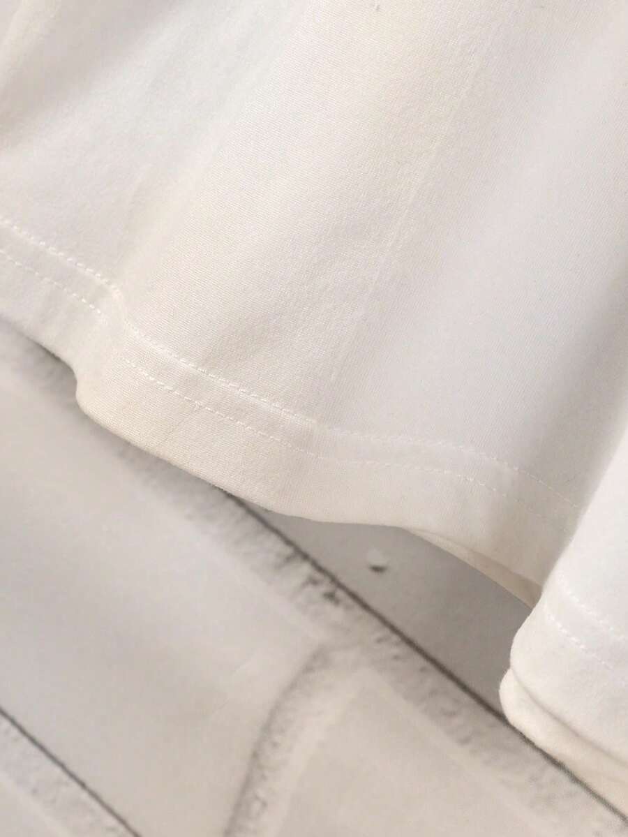 SHEIN Resyla تي شيرت أبيض بأكمام قصيرة مطرز بفيونكة