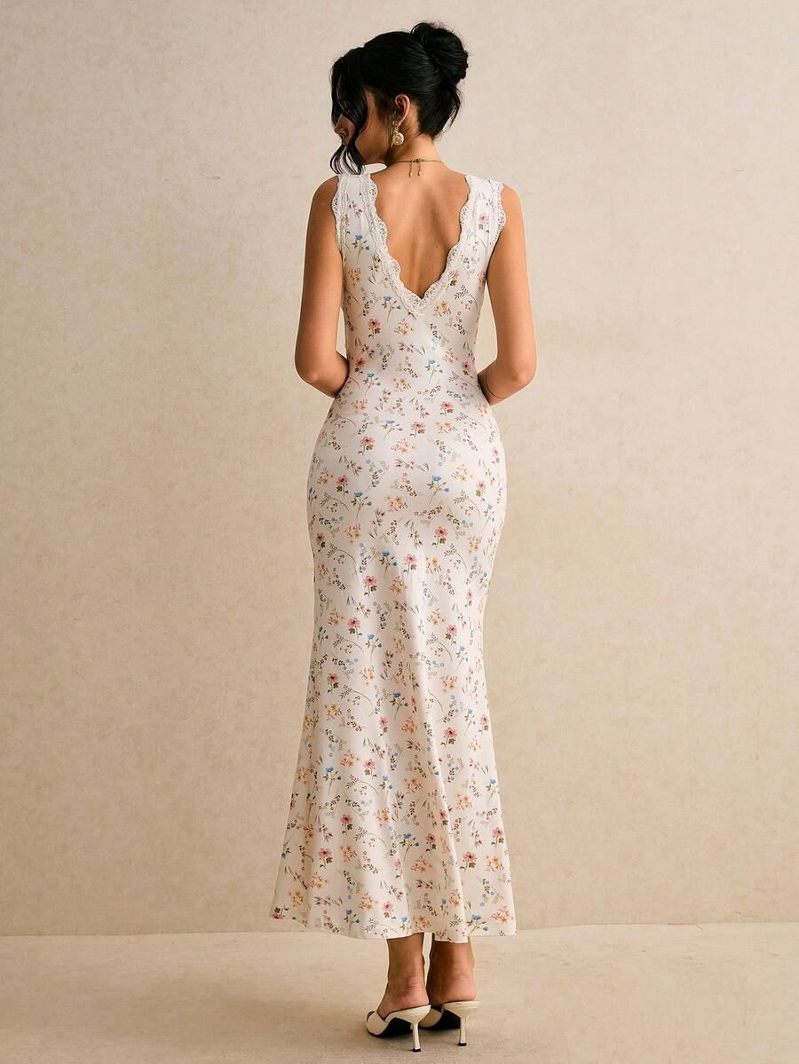 SHEIN Poéselle فستان بدون أكمام بتصميم ذيل سمكة مزين بزهور صغيرة