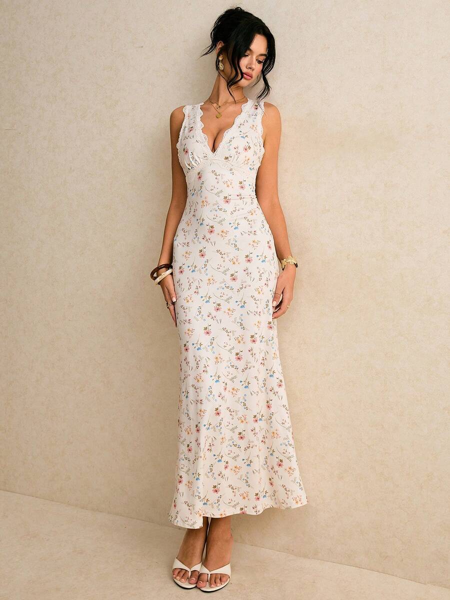 SHEIN Poéselle فستان بدون أكمام بتصميم ذيل سمكة مزين بزهور صغيرة