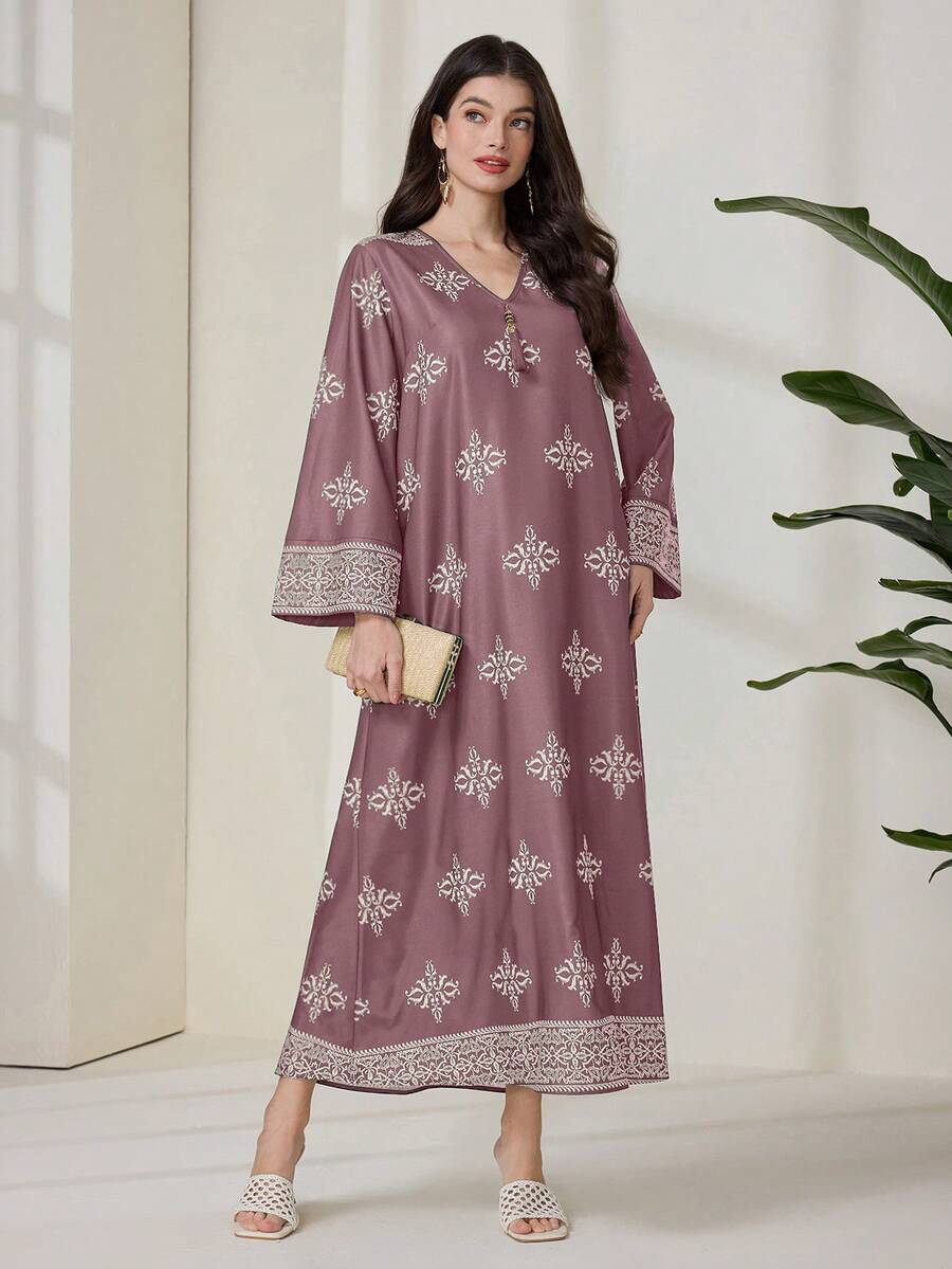 SHEIN Al Najma فستان ماكسي عربي فضفاض بطبعة زهرية وأكمام طويلة