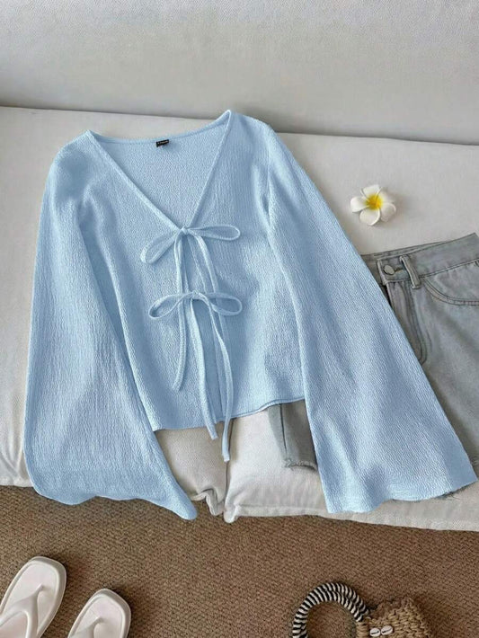 SHEIN LUNE بلوزة كاجوال بأكمام واسعة وربطات على الأساور