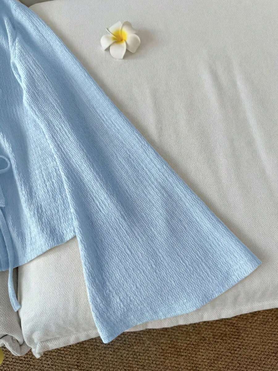 SHEIN LUNE بلوزة كاجوال بأكمام واسعة وربطات على الأساور