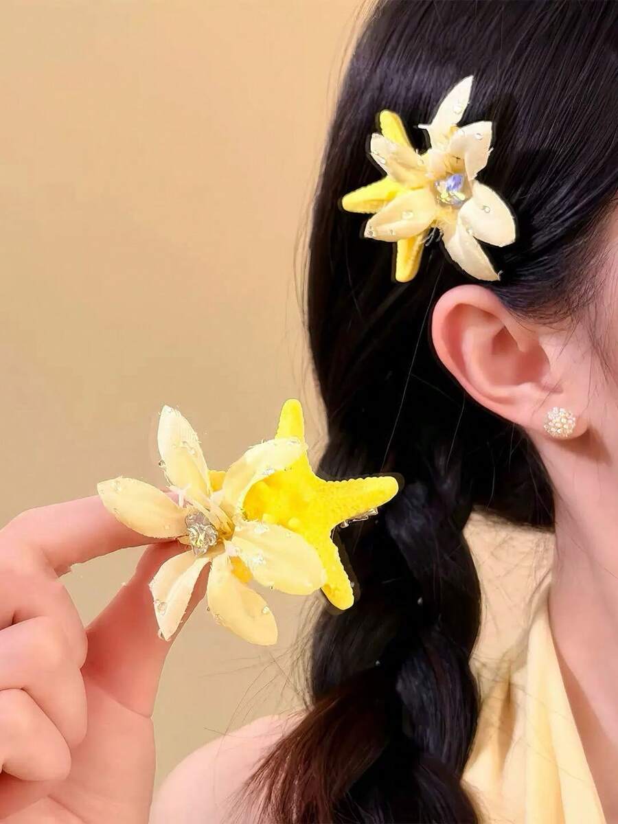 SHEIN طقم مشابك شعر قطعتين بتصميم نجمة البحر وزهرة صفراء