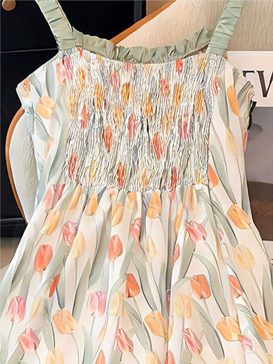 SHEIN GLOWEVE فستان بدون أكمام بطبعة زهور الزنبق بتصميم فني مزخرف