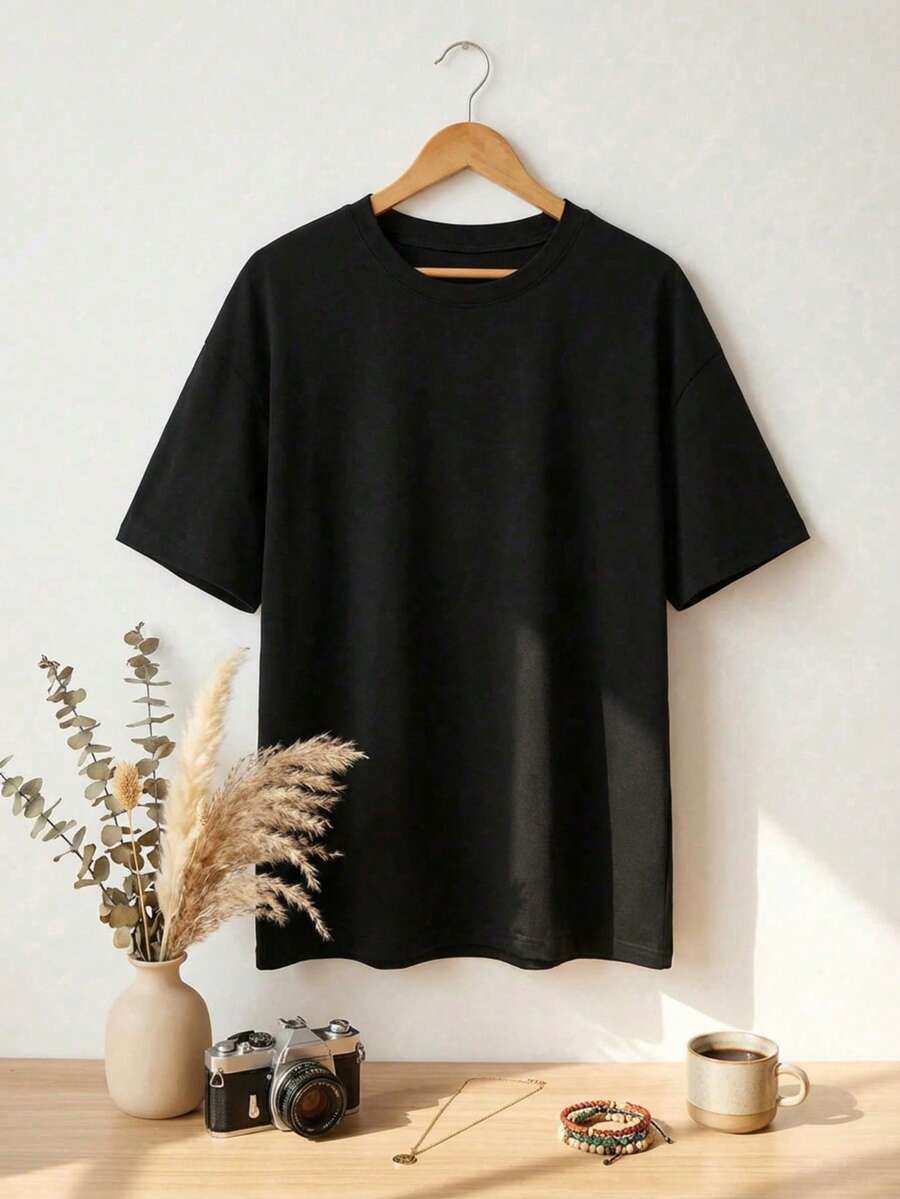 SHEIN تي شيرت أسود فضفاض بياقة دائرية وأكمام قصيرة