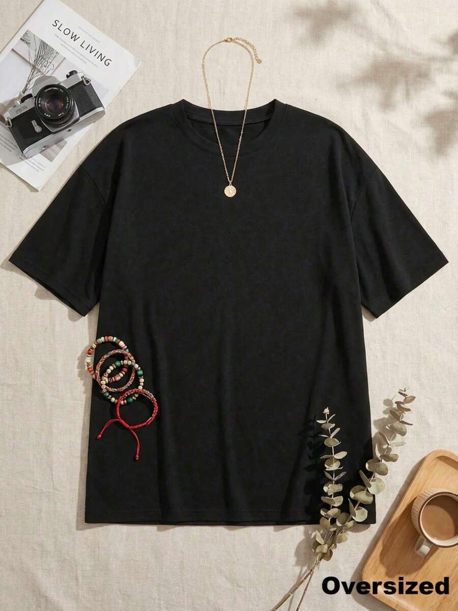 SHEIN تي شيرت أسود فضفاض بياقة دائرية وأكمام قصيرة