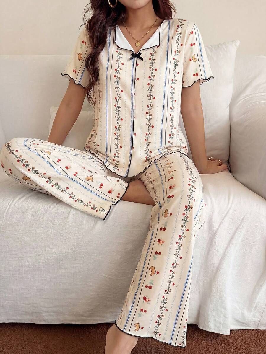 SHEIN طقم بيجامة بطبعة كرتونية بأكمام قصيرة وبنطال طويل