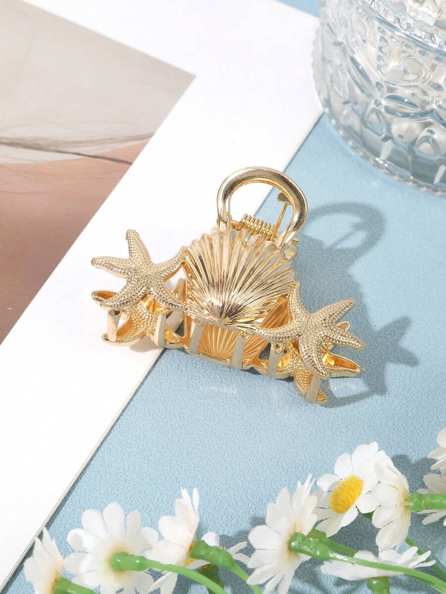 SHEIN مشبك شعر ذهبي بتصميم كائنات بحرية