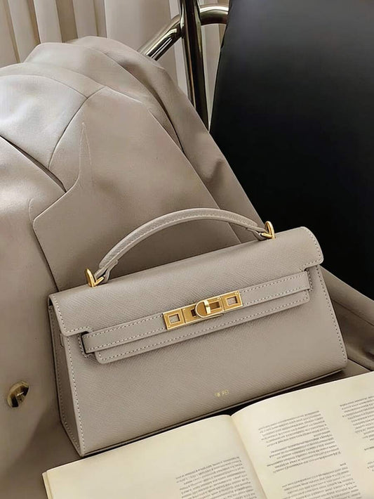 SHEIN حقيبة يد تجمع بين الجلد والنسيج المنسوج بمشبك معدني أنيق