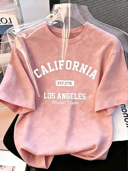 SHEIN تي شيرت كوري فضفاض بطبعة حروف وتدرج وردي ساكورا