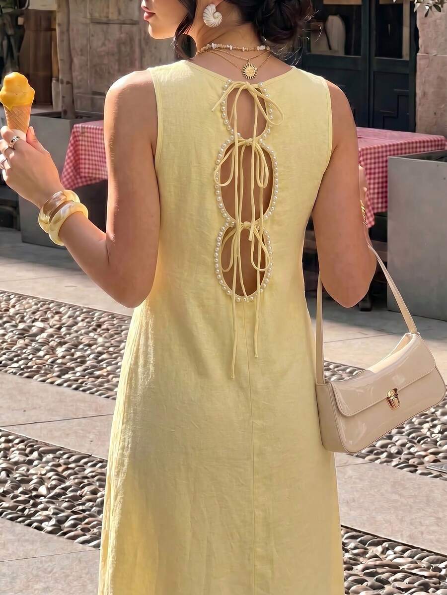 SHEIN ELENZGA فستان أصفر فاتح بدون أكمام بعقدة فراشة وتنورة واسعة