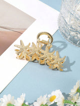 SHEIN مشبك شعر ذهبي بتصميم كائنات بحرية