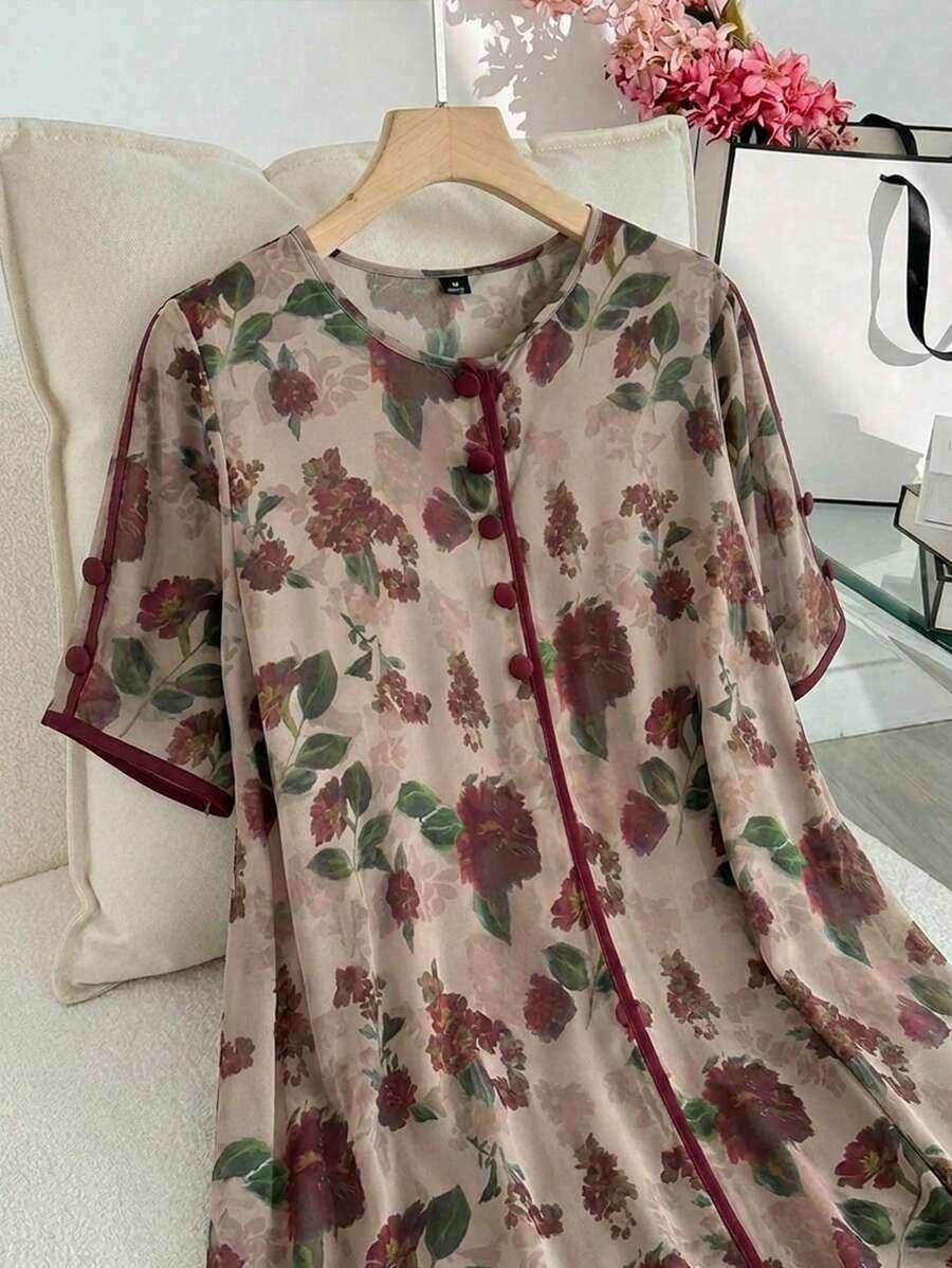 SHEIN Al Najma فستان بطبعة زهرية وأزرار أمامية وأكمام قصيرة