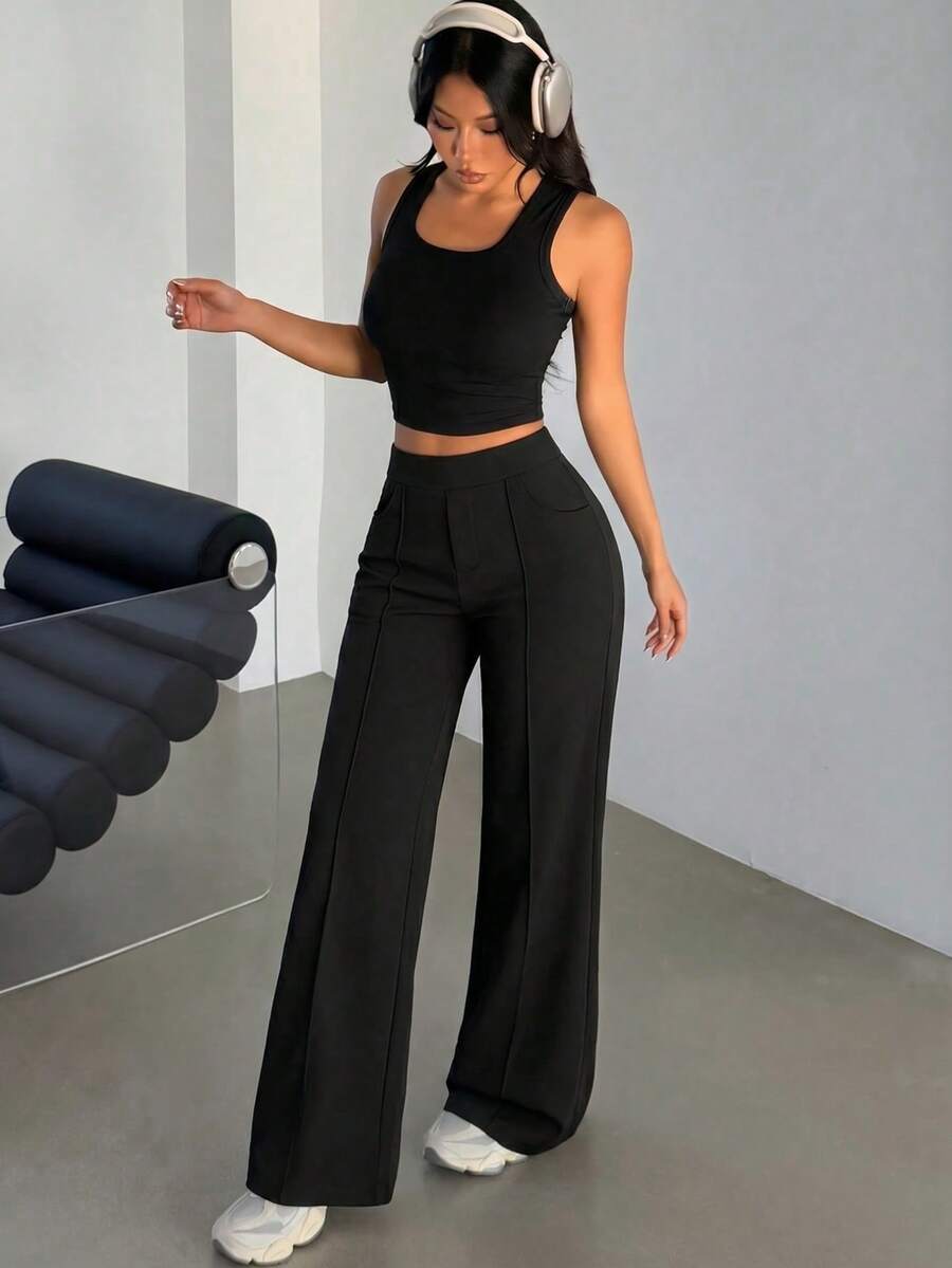 SHEIN بنطلون أسود واسع الساق بجيوب وقماش مرن