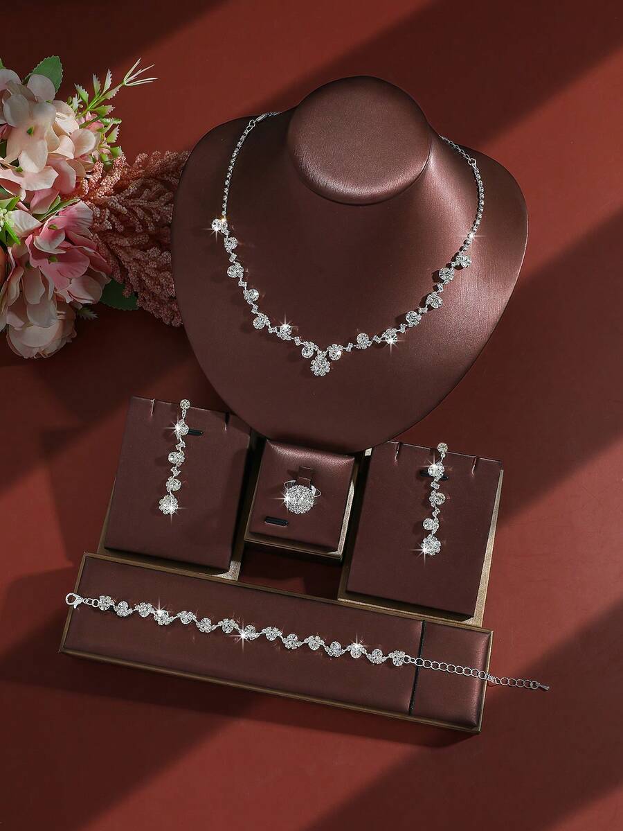 SHEIN طقم مجوهرات 4 قطع قلادة وأقراط وسوار وخاتم مرصعة بالراينستون