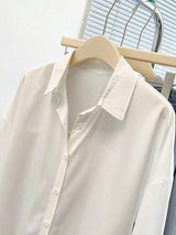 SHEIN INAWLY قميص نسائي أبيض بأزرار