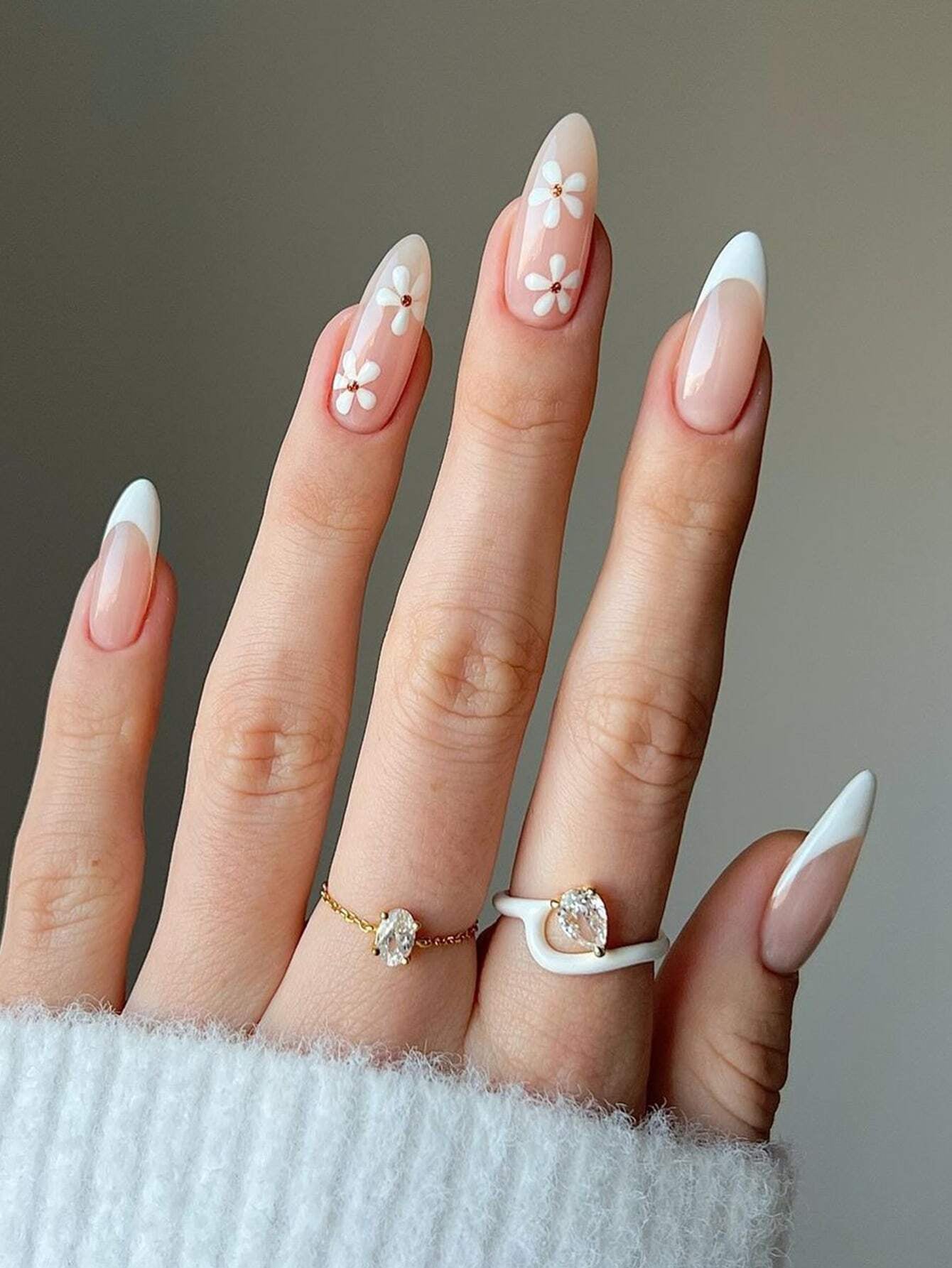24Pcs False Nails in Waterdrop Shape, Black French Manicure with Small Flowers & Pointy Almond Shape +Jelly Glue + Nail File