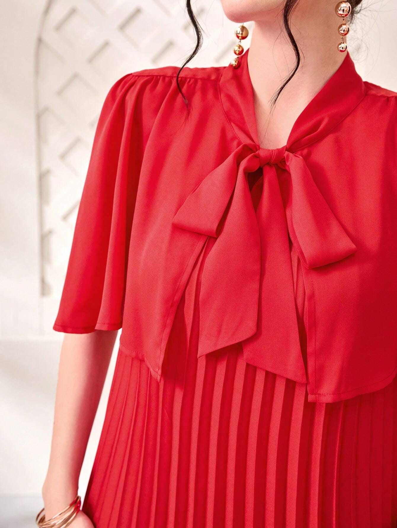 Najma Tie Neck Pleated Hem Dress