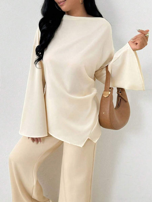 SHEIN INAWLY  بلوزة ناعمة بطول مميز وقصة أنثوية