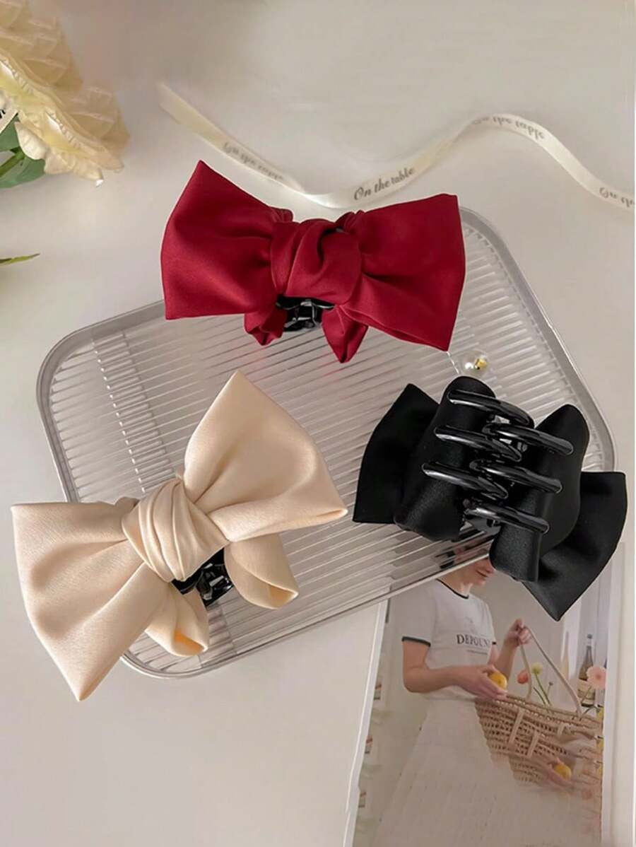 SHEIN مشبك شعر بفيونكة ساتان أنيقة لون أسود