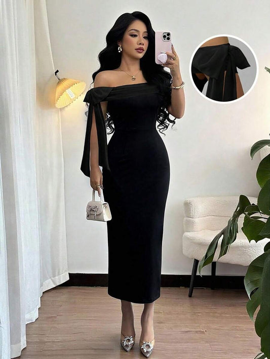 SHEIN Rafferiza فستان طويل أسود كتف مكشوف مزين بعقدة