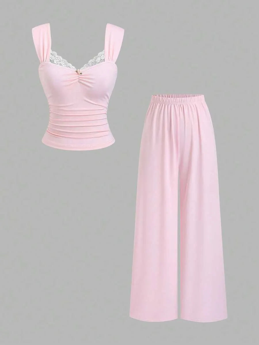 SHEIN طقم نسائي قطعتين (توب بدون أكمام بدانتيل وزهرة + بنطلون واسع الساق)