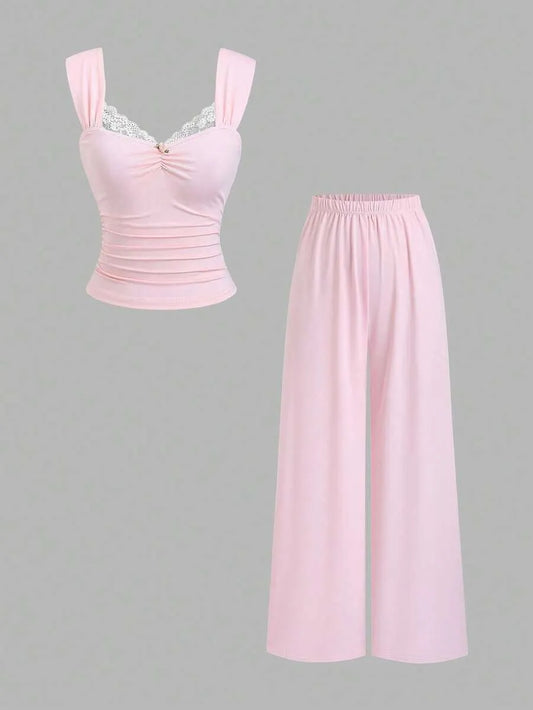 SHEIN طقم نسائي قطعتين (توب بدون أكمام بدانتيل وزهرة + بنطلون واسع الساق)
