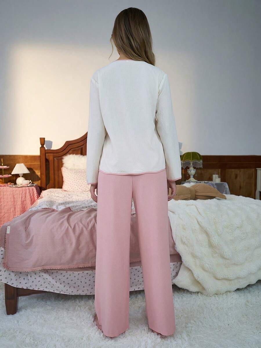 SHEIN Sanrio Hello Kitty  طقم بيجامة نوم مشمشي بطبعة
