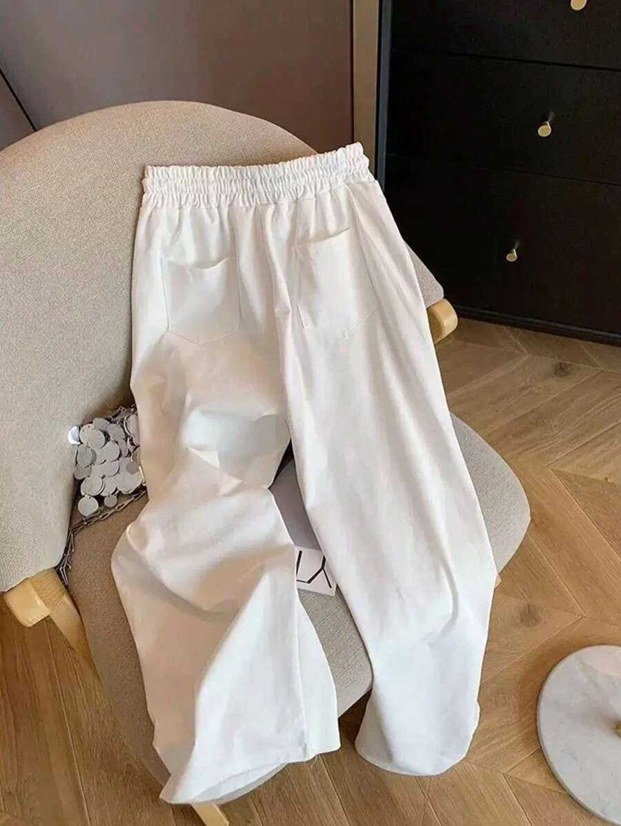 SHEIN بنطلون كاجوال واسع ومستقيم الساق بلون أبيض