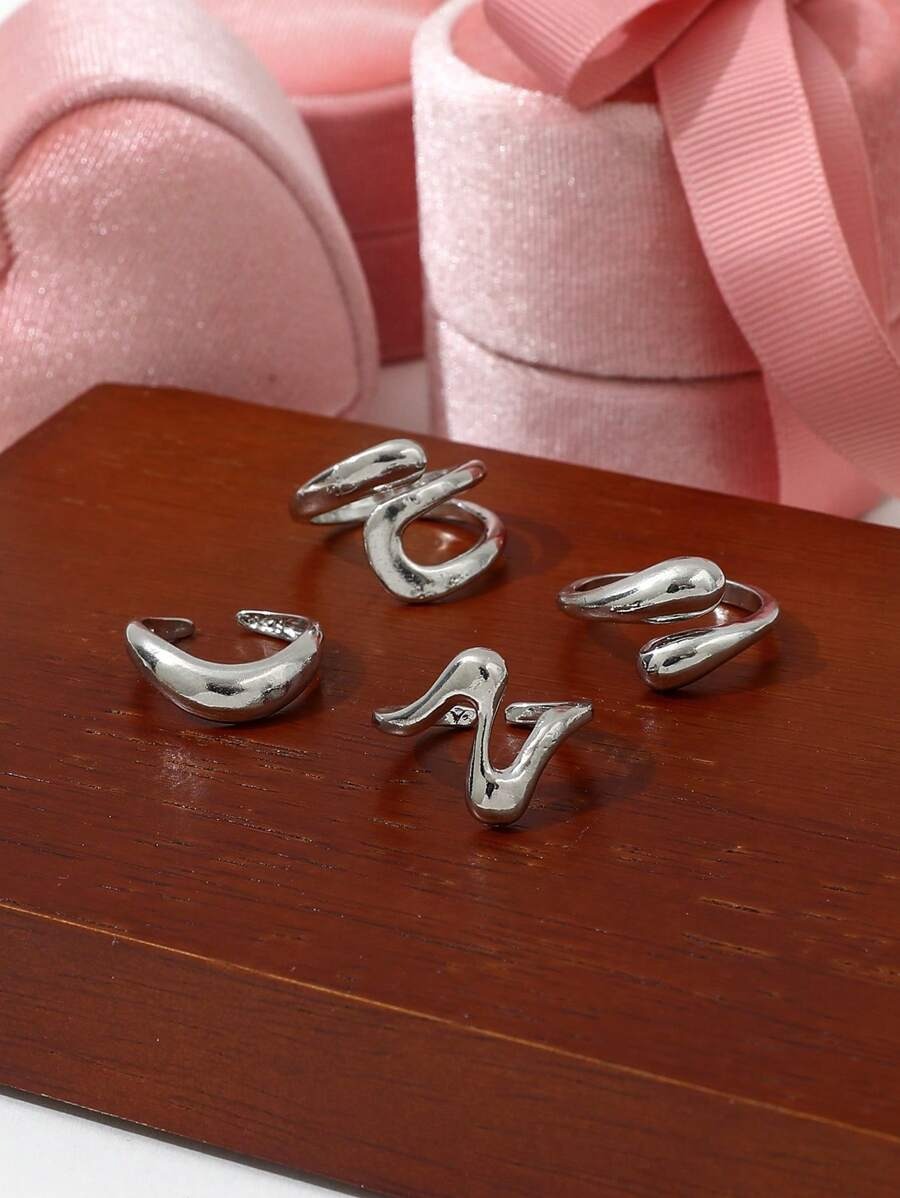 SHEIN مجموعة 4 خواتم فضية بتصميم دائري مفتوح