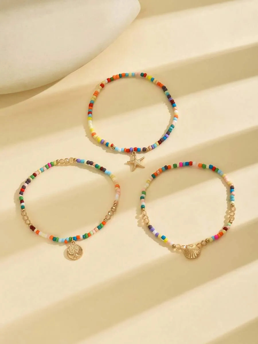 SHEIN أساور كاحل لؤلؤ وخرز ونجمة بحر وقواقع 3 قطع